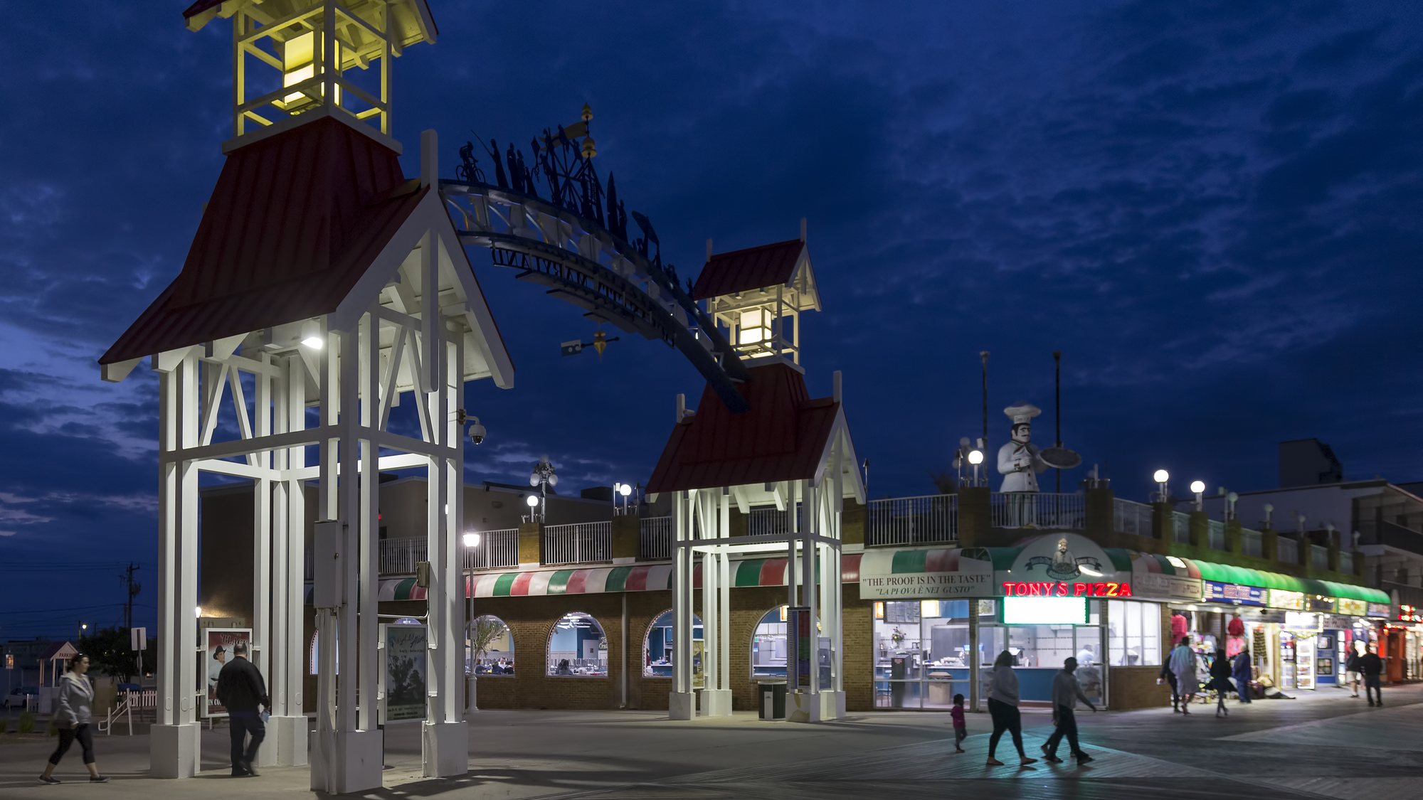 The boardwalk entrance in Ocean City, Maryland, at dusk